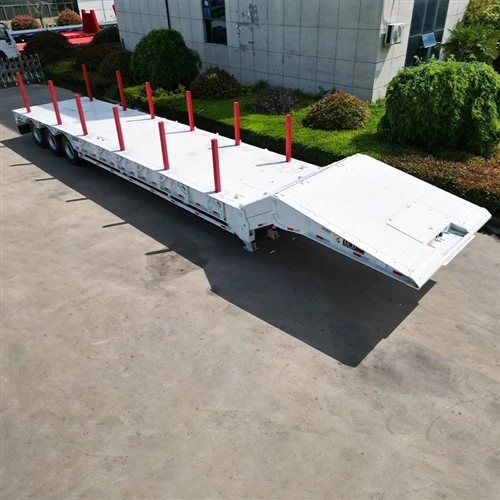 New 3-Axle Lowbed Semi Trailer With Stakes For Heavy Construction Machinery Transport
